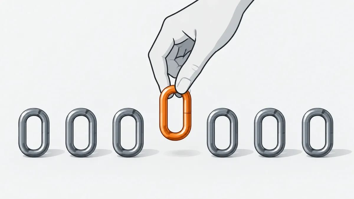 A hand lifting one chain link out of a row of seven
