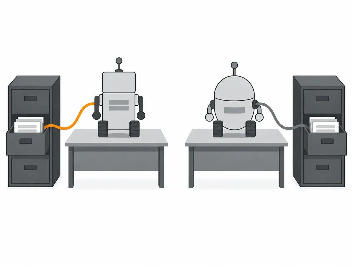 Two desks side by side, each with its own small robot cabled to its own filing cabinet with an open drawer of papers; the cable on the left is orange